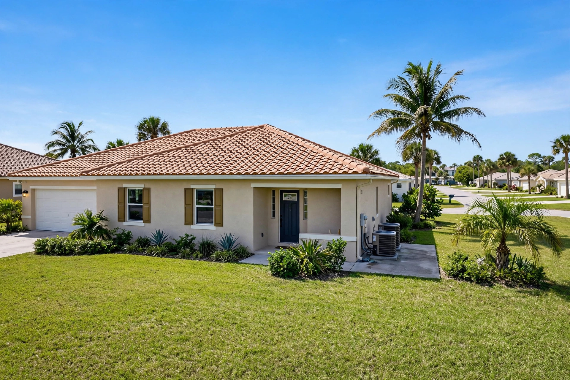 Florida home with outdoor AC units on a concrete pad